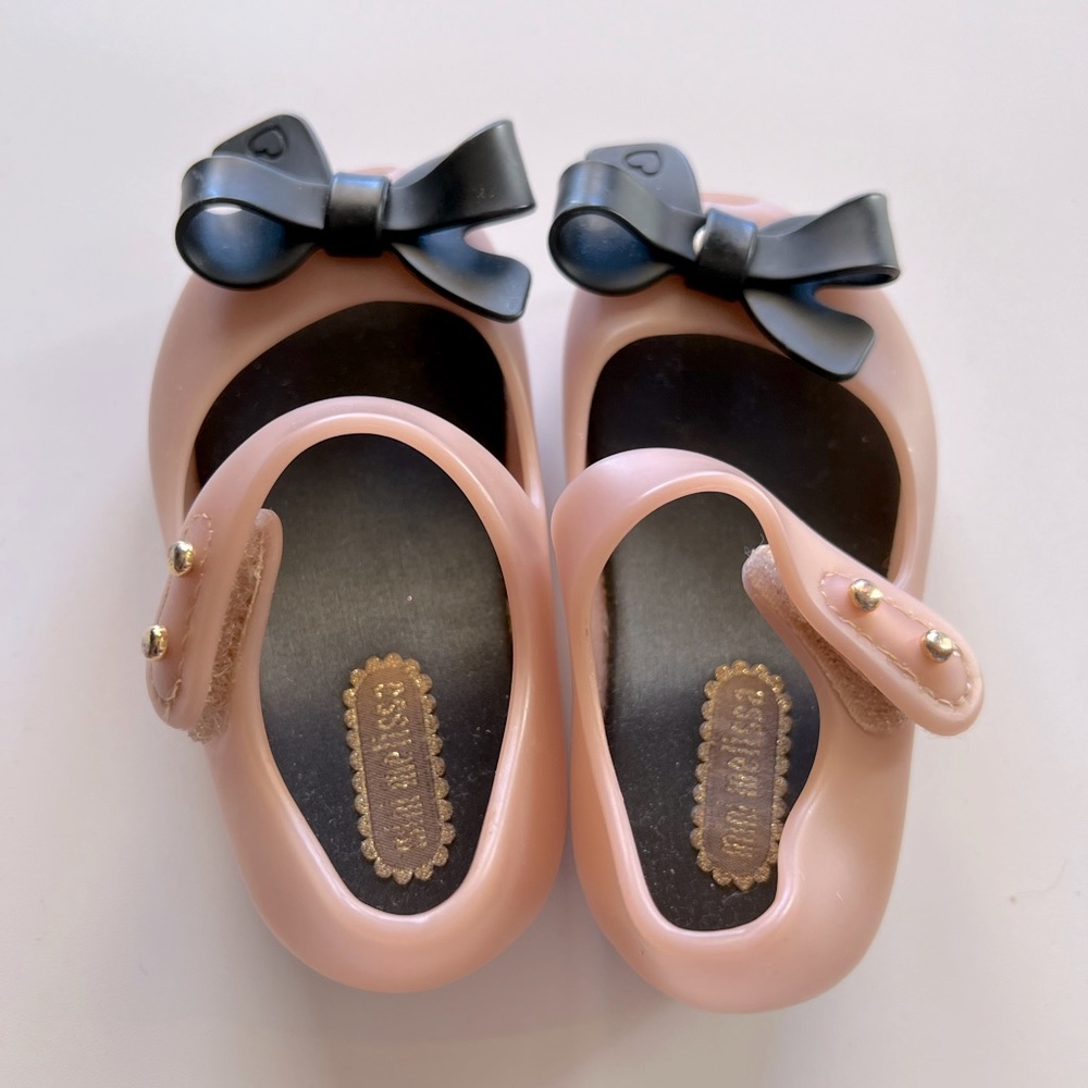 Mini Melissa size 5 blush shoes with black bow